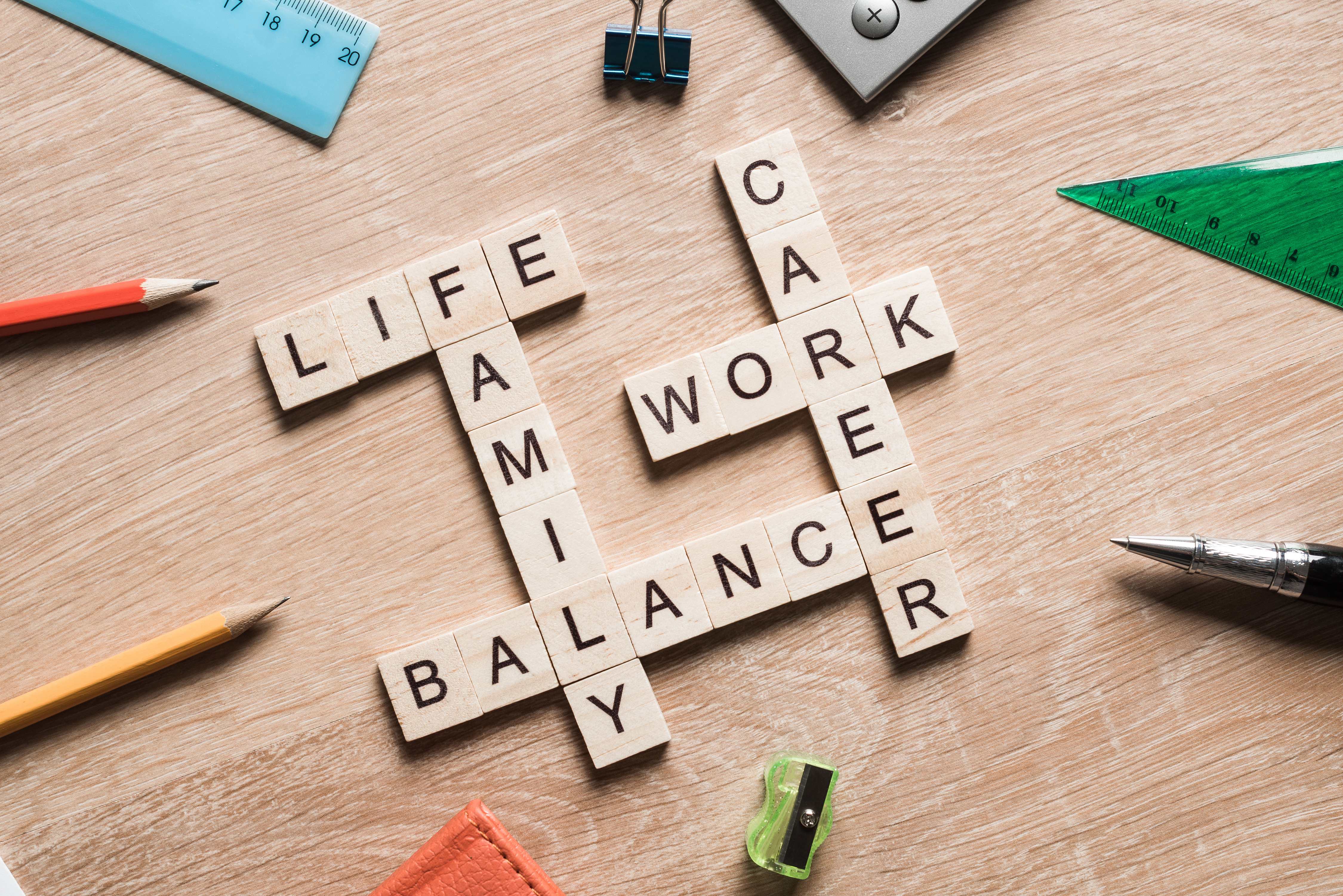scrabble letters spelling life, family, balance