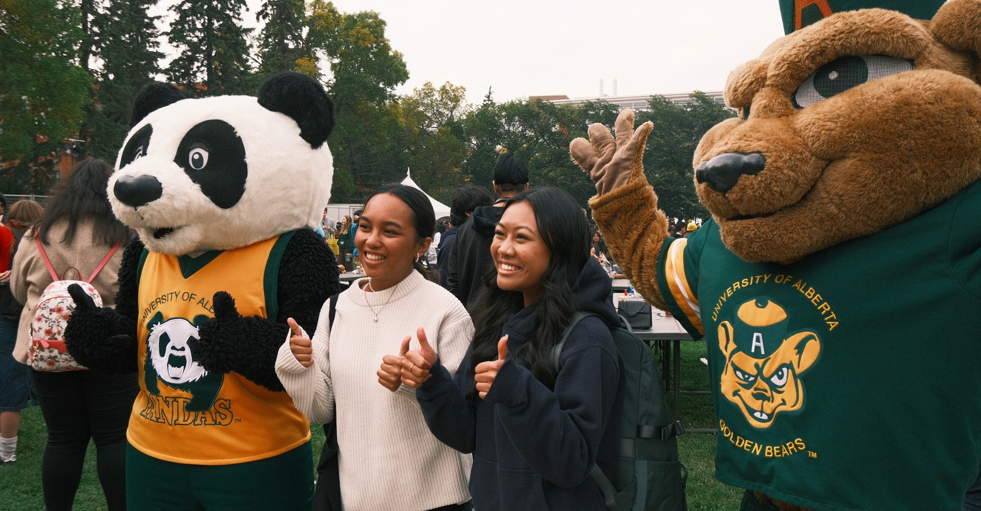 Students posing with the bears