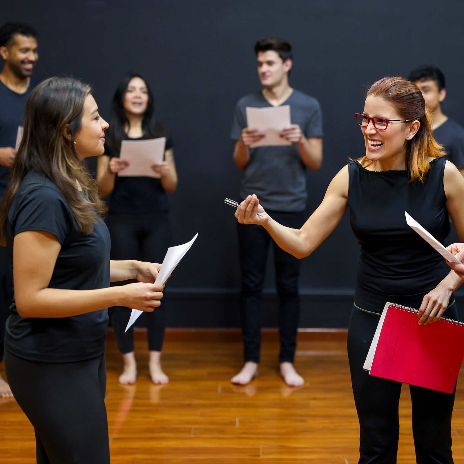 Theatre student receives notes from a director