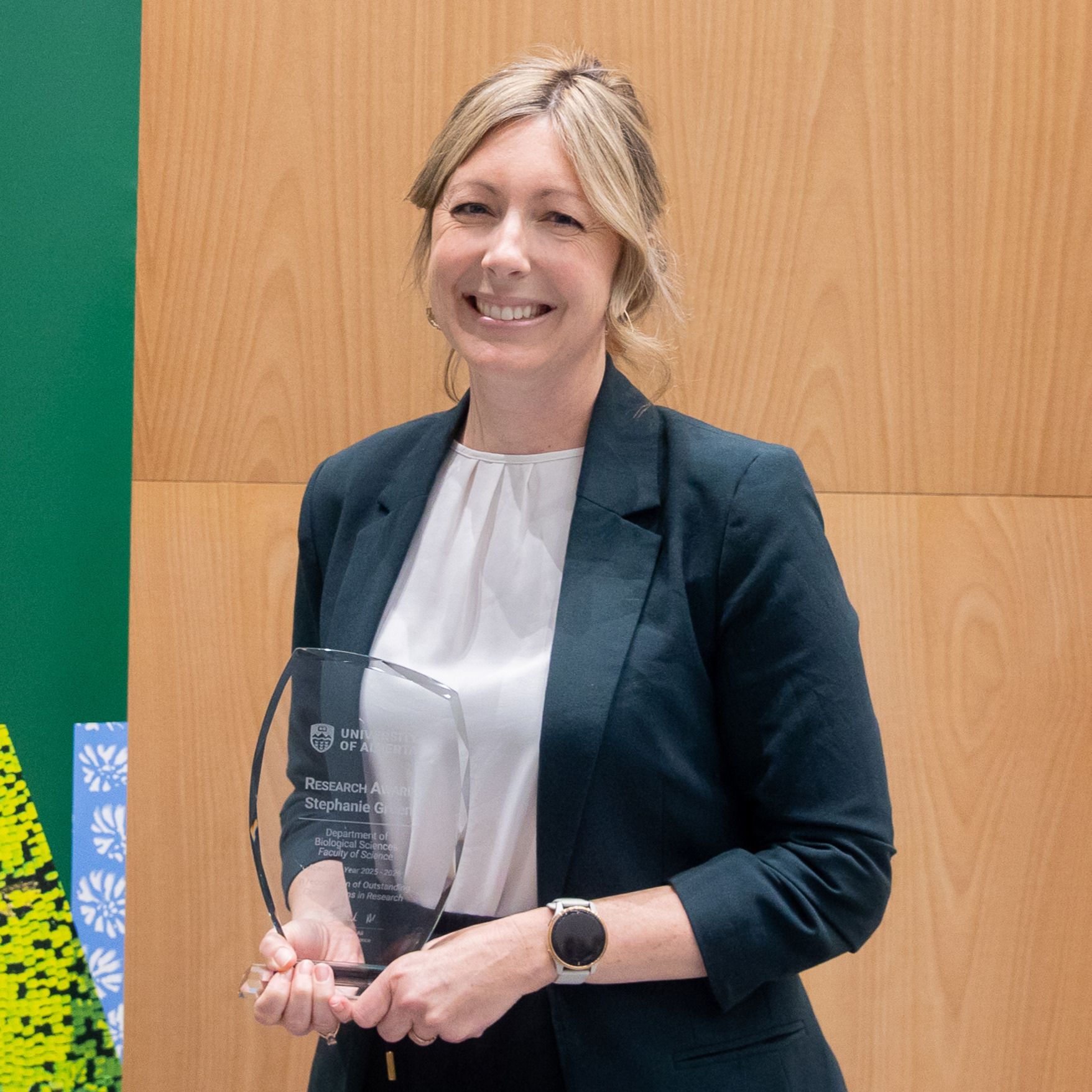 Photo of Stephanie Green receiving an award at the 2026 Celebration of Excellence.